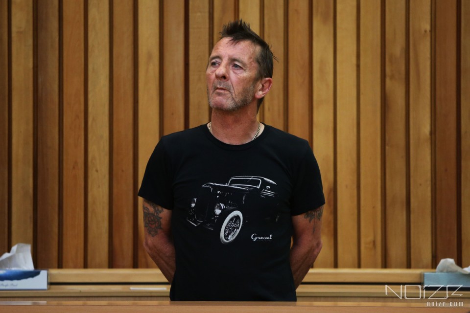 Phil Rudd in the Tauranga District Court in New Zealand &mdash; AC/DC's drummer pleaded guilty to threatening to kill